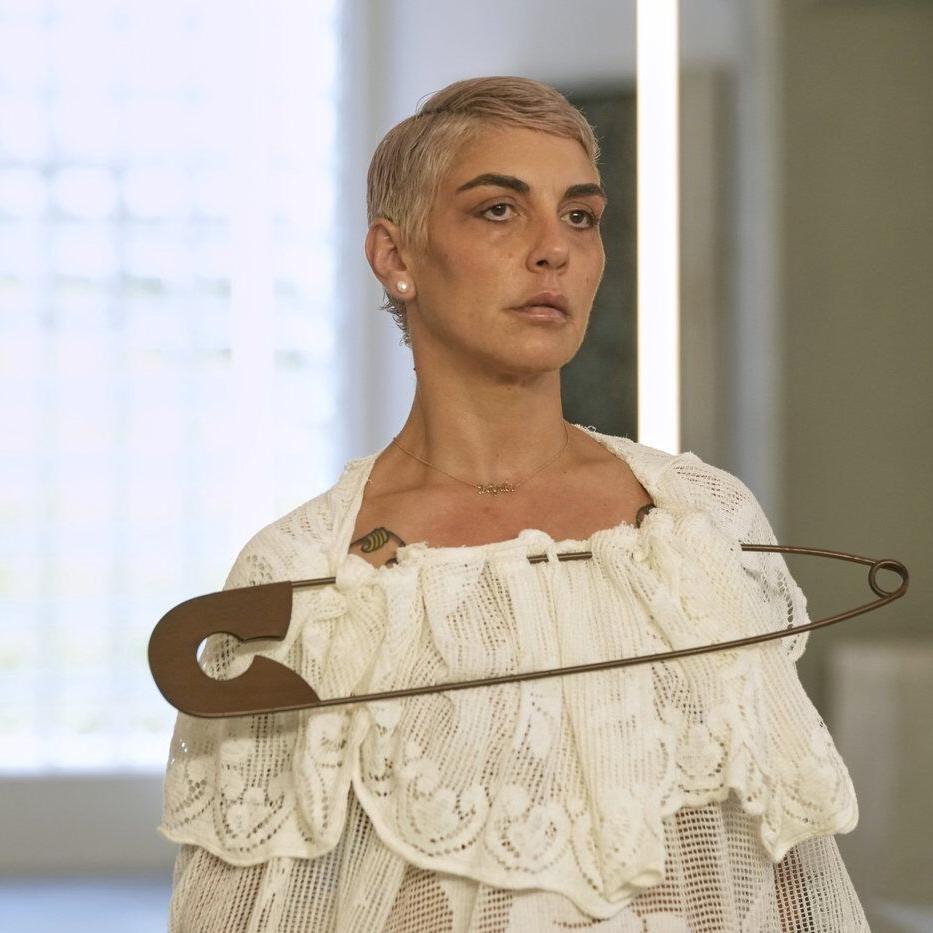 Simon Cracker creates a brand uniform to highlight star upcycled garments during Milan Fashion Week